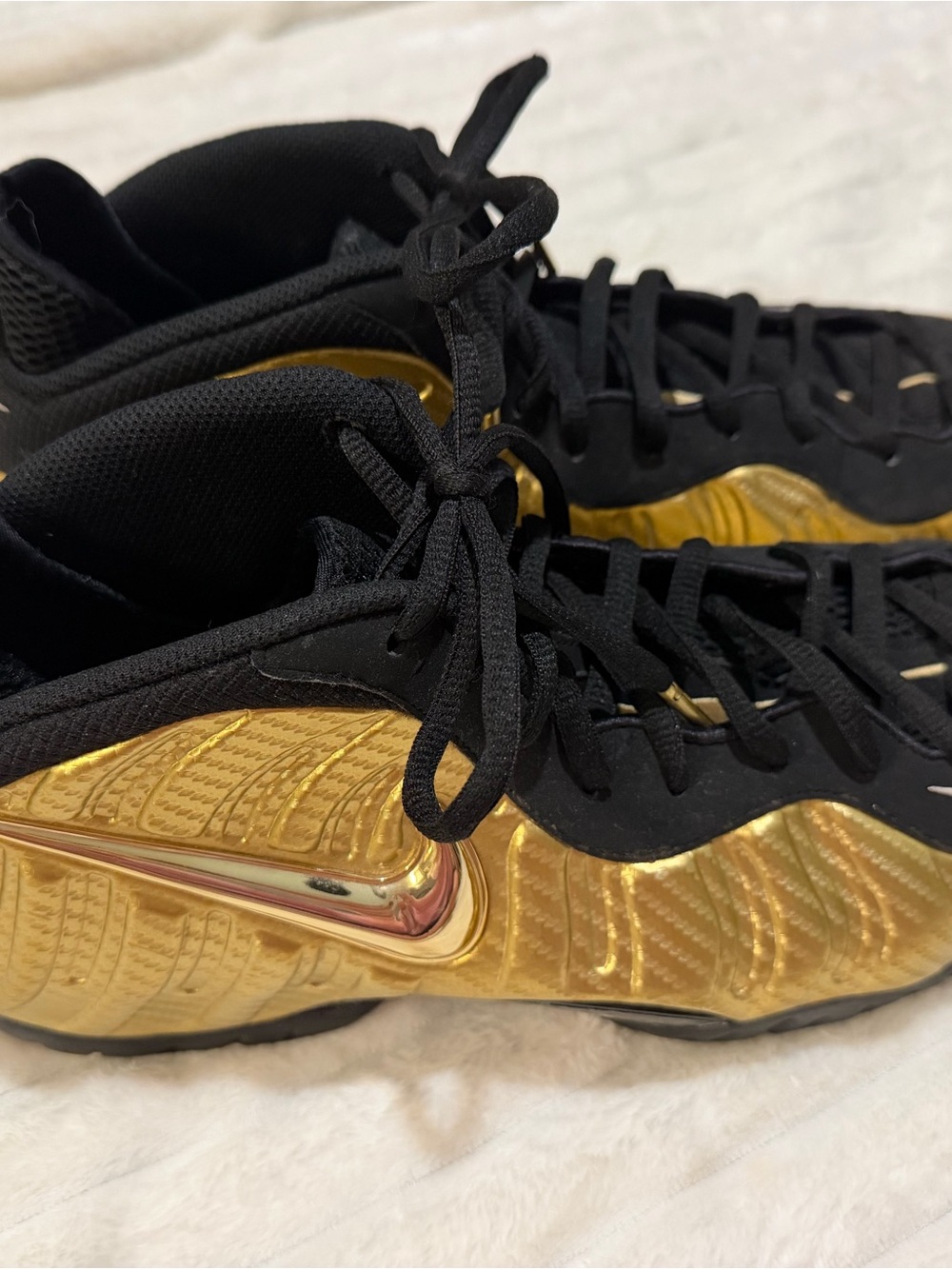 Nike Air Black and Gold Metallic Foamposite Pro